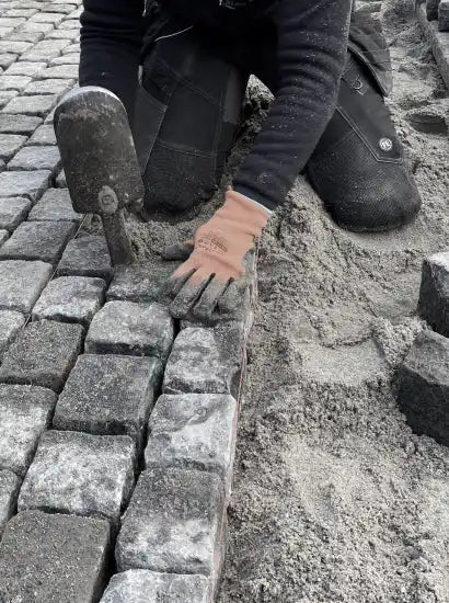 Installation af brostenbelægning.